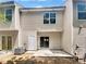 Townhome back yard with concrete patio and AC unit at 1748 Broad River Rd, Atlanta, GA 30349