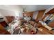 Main bedroom with wood paneled walls and ceiling fan at 688 Main St, Whitesburg, GA 30185