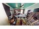 Bedroom with teal ceiling and fireplace at 688 Main St, Whitesburg, GA 30185