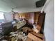 Main bedroom with wooden walls and window at 688 Main St, Whitesburg, GA 30185