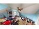 Small bedroom with ceiling fan and window at 688 Main St, Whitesburg, GA 30185