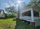 White house with wrap around porch, large yard at 688 Main St, Whitesburg, GA 30185