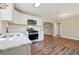 Modern kitchen with white cabinets, stainless steel appliances, and marble countertops at 1849 Broad Ave, Atlanta, GA 30344