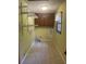 Laundry room with tile floor and ample shelving at 3705 Sandhill Se Dr, Conyers, GA 30094