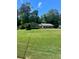 Ranch home with large front yard and mature trees at 3705 Sandhill Se Dr, Conyers, GA 30094