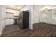 Modern kitchen with white cabinets, granite countertops, and stainless steel appliances at 2576 Godfrey Nw Dr, Atlanta, GA 30318