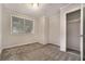 Simple bedroom with carpet flooring and ample closet space at 2576 Godfrey Nw Dr, Atlanta, GA 30318