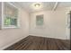 Bright dining area with hardwood floors and window views at 2576 Godfrey Nw Dr, Atlanta, GA 30318