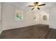 Spacious living room featuring hardwood floors and ceiling fan at 2576 Godfrey Nw Dr, Atlanta, GA 30318