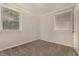 Cozy bedroom with neutral walls and carpet flooring at 2576 Godfrey Nw Dr, Atlanta, GA 30318