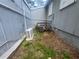 Rear exterior view of the home showcasing the HVAC unit and surrounding area at 366 Hamilton E Holmes Nw Dr, Atlanta, GA 30318