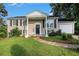 House exterior with manicured lawn and attached garage at 2853 Port Royal Ln, Decatur, GA 30034