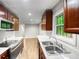 Modern kitchen with stainless steel appliances and granite countertops at 4318 Christine Ct, Decatur, GA 30035