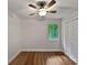 Bright bedroom with hardwood floors and ceiling fan at 4318 Christine Ct, Decatur, GA 30035