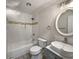 Updated bathroom with a white vanity, updated shower, and a large mirror at 4318 Christine Ct, Decatur, GA 30035