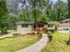 Charming ranch home with a well-maintained front yard and walkway at 4318 Christine Ct, Decatur, GA 30035