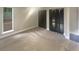 Spacious bedroom with carpet, window and closet at 51 Holt Ne Rd, Marietta, GA 30068