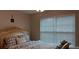 Bedroom with a sleigh bed and window blinds at 3364 Joseph Nw Dr, Acworth, GA 30101
