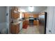 Bright kitchen featuring stainless steel appliances and light wood cabinets at 3364 Joseph Nw Dr, Acworth, GA 30101