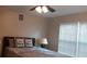 Bedroom with a queen-size bed and window blinds at 3364 Joseph Nw Dr, Acworth, GA 30101