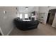 Spacious living room with sectional sofa and fireplace at 3364 Joseph Nw Dr, Acworth, GA 30101