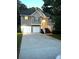 Two-story house with a two-car garage and a landscaped yard at 3364 Joseph Nw Dr, Acworth, GA 30101
