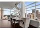 Modern dining room with city views and large windows at 45 Ivan Allen Jr Nw Blvd # 2705, Atlanta, GA 30308