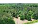 Aerial view of property showcasing large wooded area at 2576 E Paulding Dr, Dallas, GA 30157