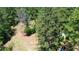 Aerial view of a wooded lot with a shed at 2576 E Paulding Dr, Dallas, GA 30157