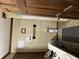 Small bathroom with vintage wallpaper and tiled floor at 2576 E Paulding Dr, Dallas, GA 30157