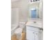 Clean bathroom featuring a toilet, vanity sink, and bathtub at 6756 Blackstone Pl # 6, Mableton, GA 30126