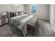 Bright bedroom with king-size bed and carpeted floor at 6756 Blackstone Pl # 6, Mableton, GA 30126