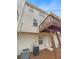 Townhouse back exterior showcasing a deck and private backyard at 6756 Blackstone Pl # 6, Mableton, GA 30126