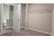 Large walk-in closet with wire shelving and carpet flooring at 3203 Puritan Way, Mcdonough, GA 30252