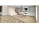 Living room with fireplace, built-in shelving, hardwood floors at 3203 Puritan Way, Mcdonough, GA 30252