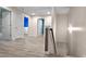Upstairs hallway with light flooring and access to bedrooms and bathroom at 3203 Puritan Way, Mcdonough, GA 30252