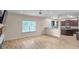 Open living room with kitchen views, LVP flooring, and a fireplace at 3203 Puritan Way, Mcdonough, GA 30252
