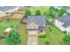 Aerial view of two-story house and surrounding neighborhood at 3203 Puritan Way, Mcdonough, GA 30252
