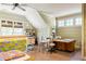 Large room with sewing machines, long worktables, and natural light at 9170 Selborne Ln, Chattahoochee Hills, GA 30268
