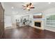 Open floorplan with kitchen, living room, and fireplace at 3483 Conley St, College Park, GA 30337