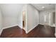 Bright bedroom with hardwood floors and access to a bathroom at 3483 Conley St, College Park, GA 30337