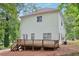 Rear view of house, showcasing deck and backyard at 3483 Conley St, College Park, GA 30337