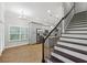 View of kitchen and stairs from breakfast area at 3483 Conley St, College Park, GA 30337