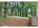 Features a backyard with a deck, concrete patio, and basketball area at 3483 Conley St, College Park, GA 30337