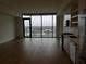 Open concept living room with hardwood floors and stunning city views at 788 W Marietta Nw St # 1111, Atlanta, GA 30318