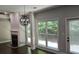 Living room with hardwood floors, fireplace, and large windows at 1400 Village Creek Se Cir # 12A, Atlanta, GA 30316