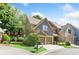 Gray townhome with two-car garage and manicured lawn at 1400 Village Creek Se Cir # 12A, Atlanta, GA 30316