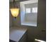 Upper landing with a light fixture and window seat offering natural light at 1400 Village Creek Se Cir # 12A, Atlanta, GA 30316