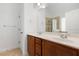 Double vanity bathroom with wood cabinets and a shower at 1400 Village Creek Se Cir # 12A, Atlanta, GA 30316