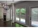 Bright dining room with hardwood floors, fireplace and access to backyard at 1400 Village Creek Se Cir # 12A, Atlanta, GA 30316